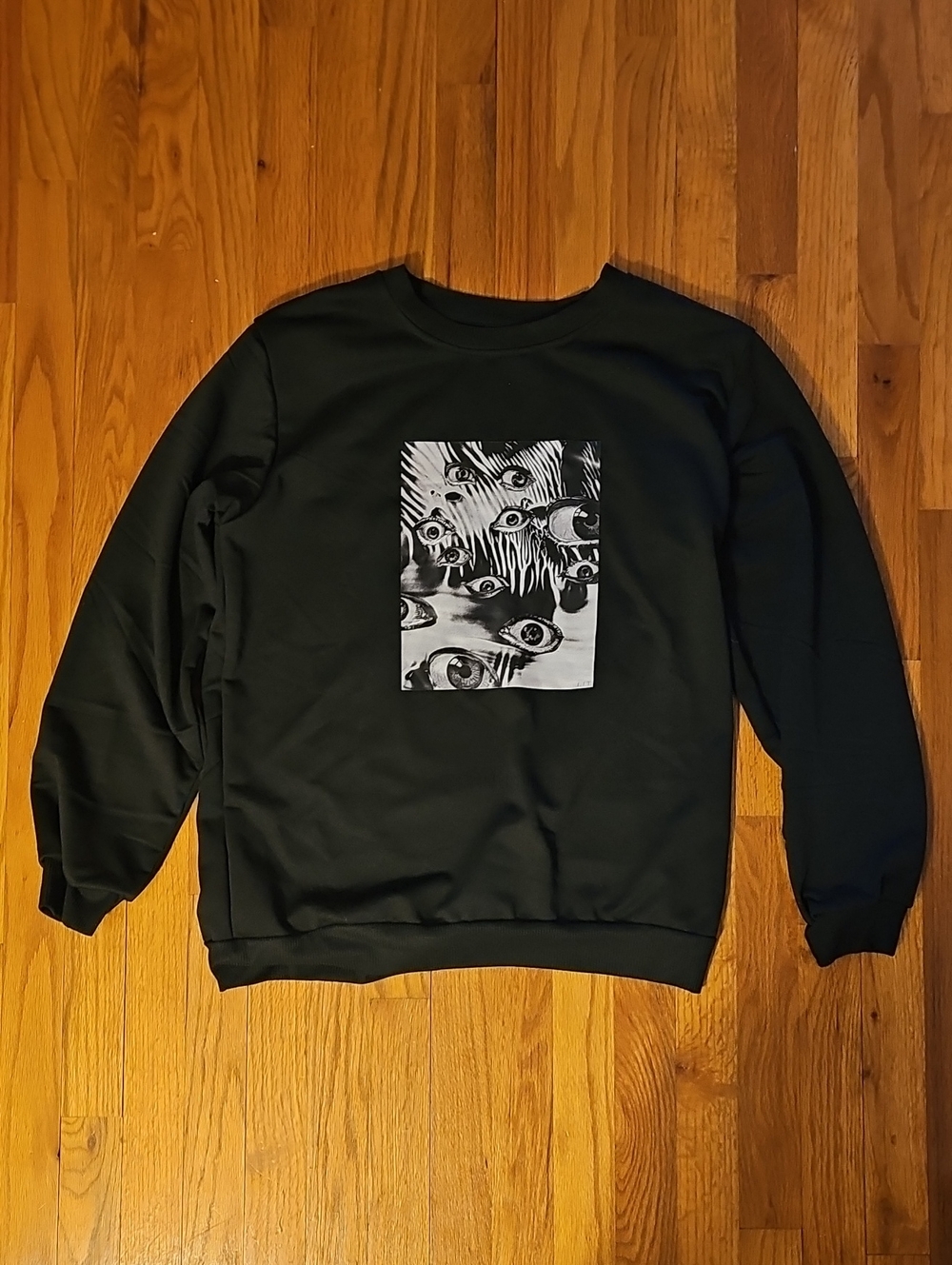 Black Eyeball Graphic Crewneck Sweatshirt - Men Size Medium.